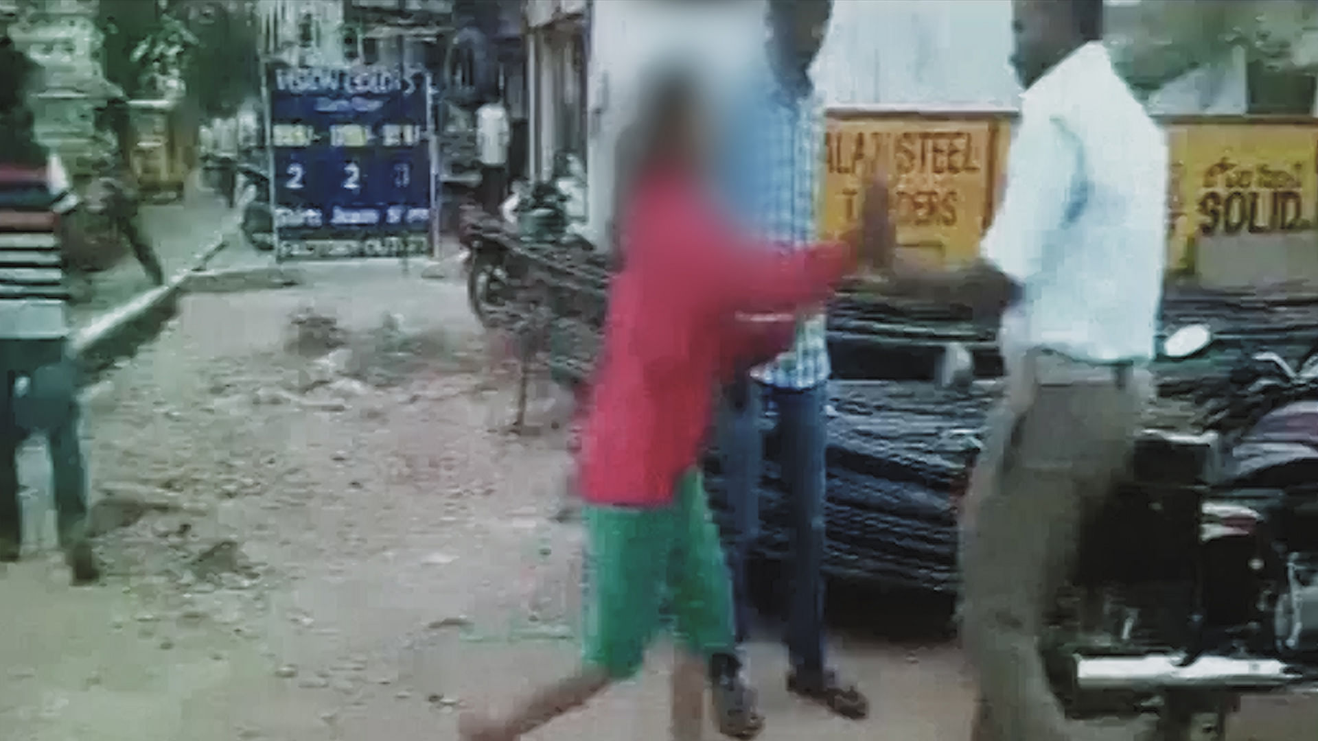 Siblings assaulted a cop after he took a photo of them violating traffic rules in Hyderabad. (Photo: ANI screengrab)