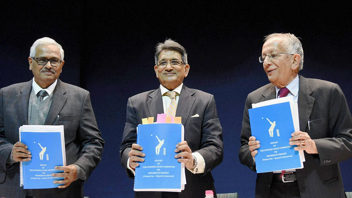 Chairman of the Supreme Court Committee on Reforms in Cricket Justice (retd.) R M Lodha with members Justice Ashok Bhan (R) and Justice R V Raveendran showing the copy of their report at a press conference in New Delhi on Monday. (Photo: PTI)