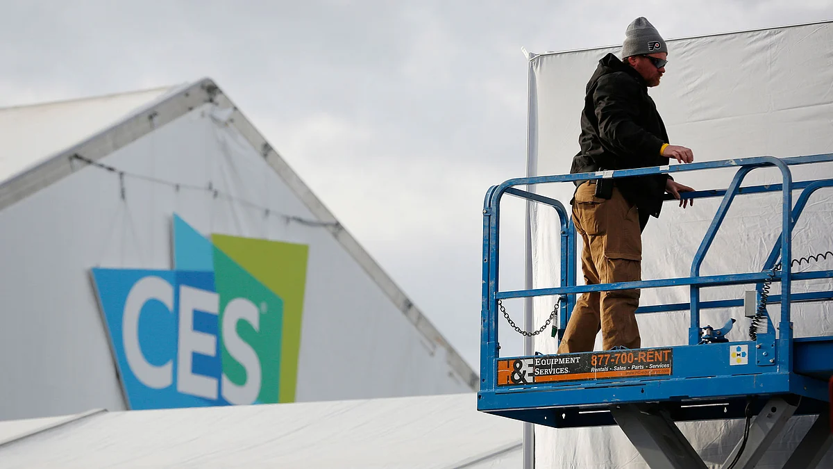 A worker helps prepare a temporary structure in preparation for the International CES gadget show Sunday, 3 January 2016, in Las Vegas. The show officially kicks off Wednesday, Jan. 6. (Photo: AP/John Locher)
