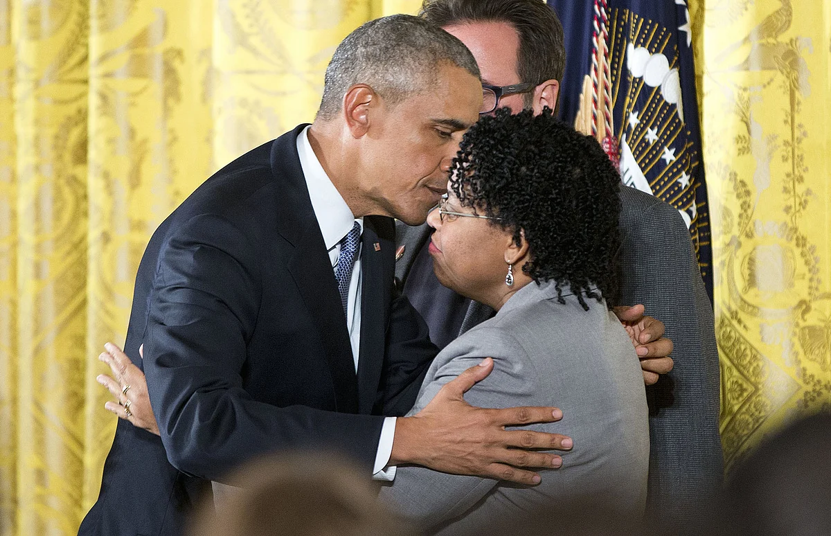 President Barack Obama embraces Jennifer Pinckney, wife of Reverend Clementa Pinckney, who was killed in the 2015 Charleston church shooting. (Photo: AP)