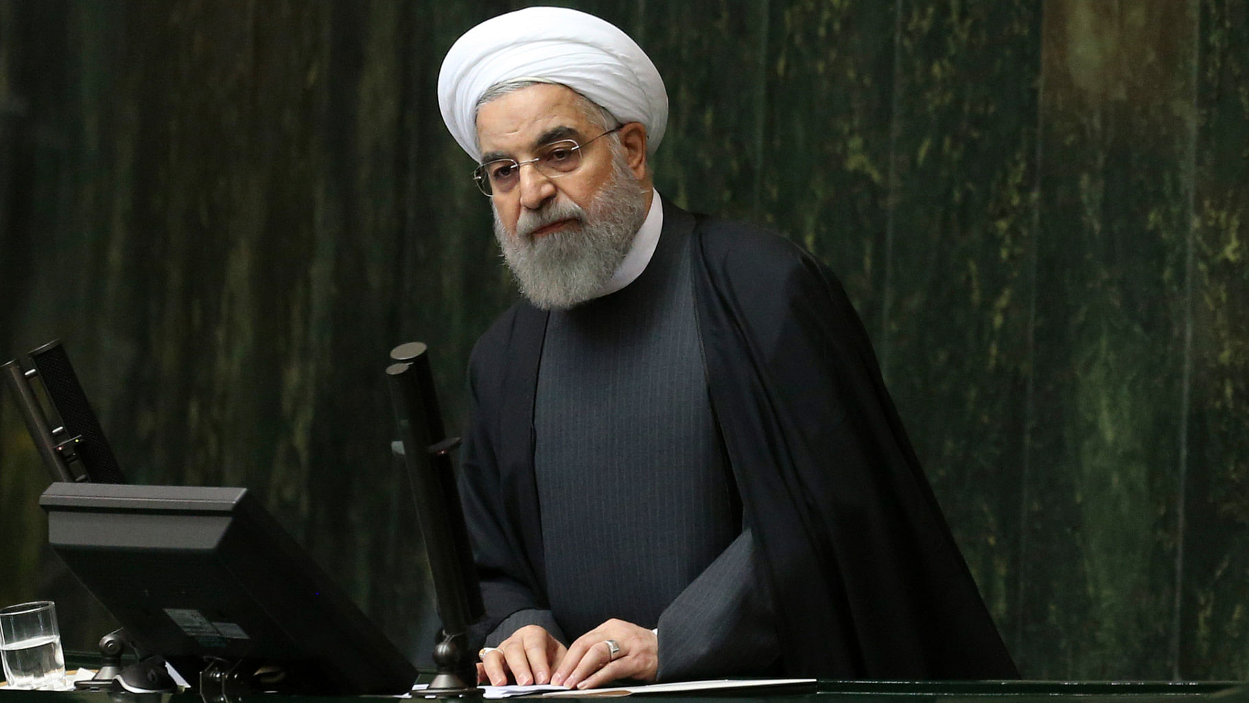 Iranian President Hassan Rouhani addresses lawmakers in an open session of parliament. He said the official implementation of the deal has satisfied all parties except radical extremists. (Photo: AP)&nbsp;