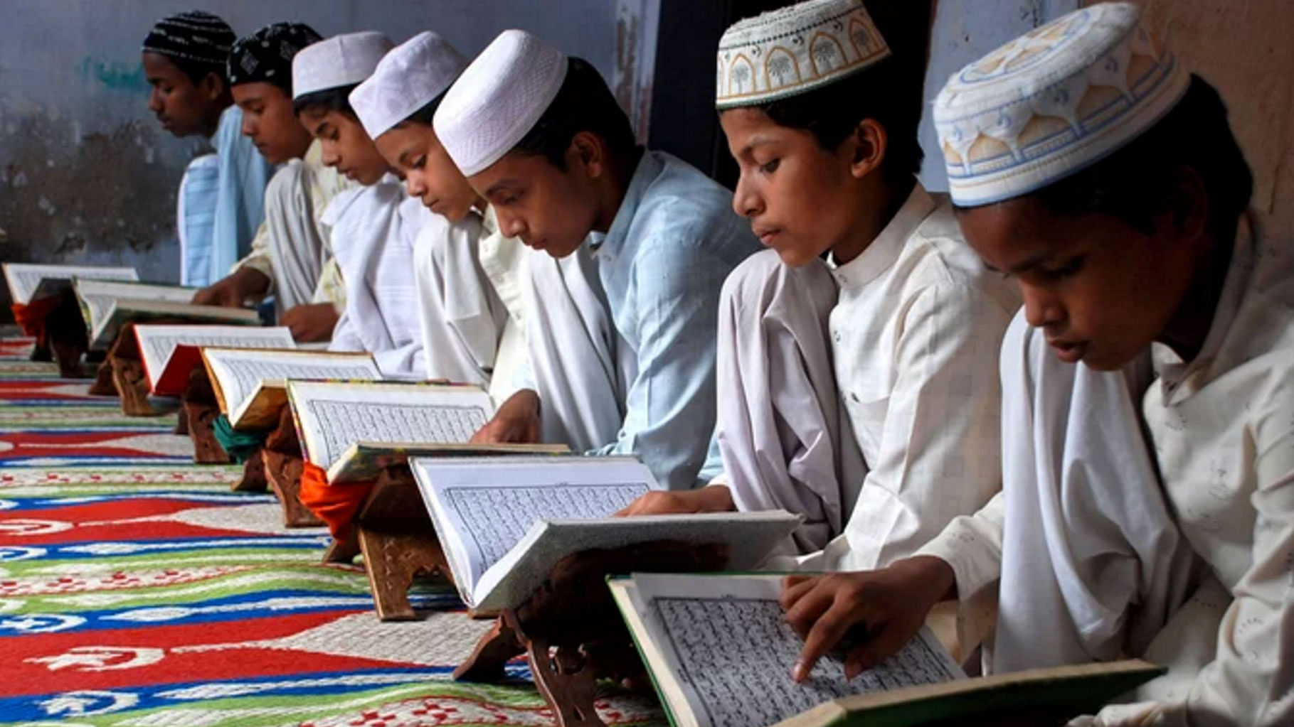 Children read the Koran at a madarsa on the first day of the holy month of Ramadan. (Photo: Reuters)&nbsp;