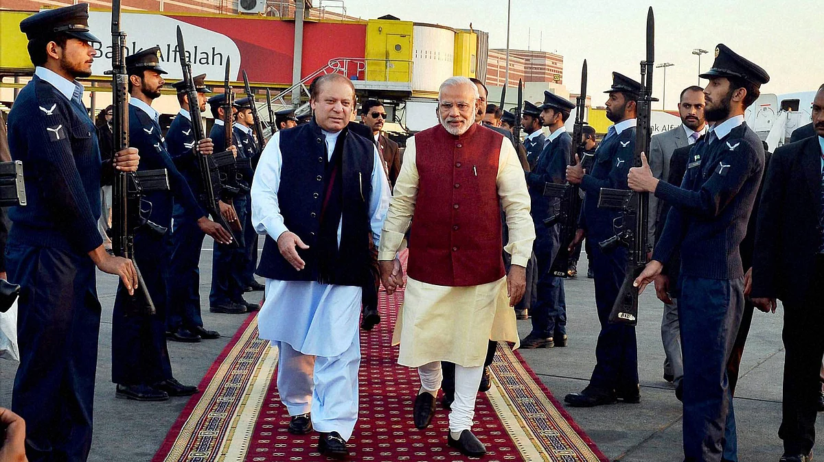 Prime Minister Narendra Modi is received by his Pakistani counterpart Nawaz Sharif upon his arrival in Lahore, December 30, 2015. (Photo: PTI)
