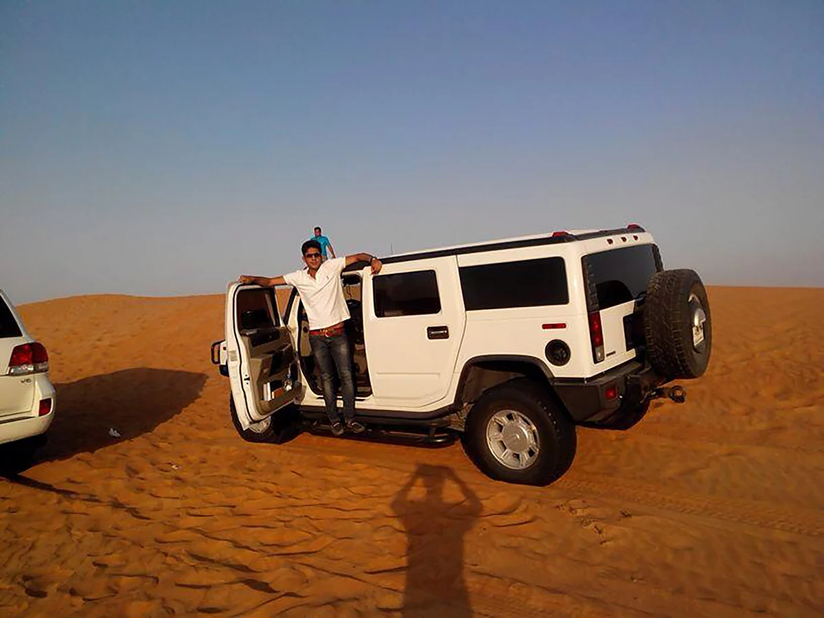 Ambia with his white hummer. (Photo: <a href="https://www.facebook.com/photo.php?fbid=534143153320738&set=a.303481266386929.65638.100001751742452&type=3&theater">Facebook</a>)