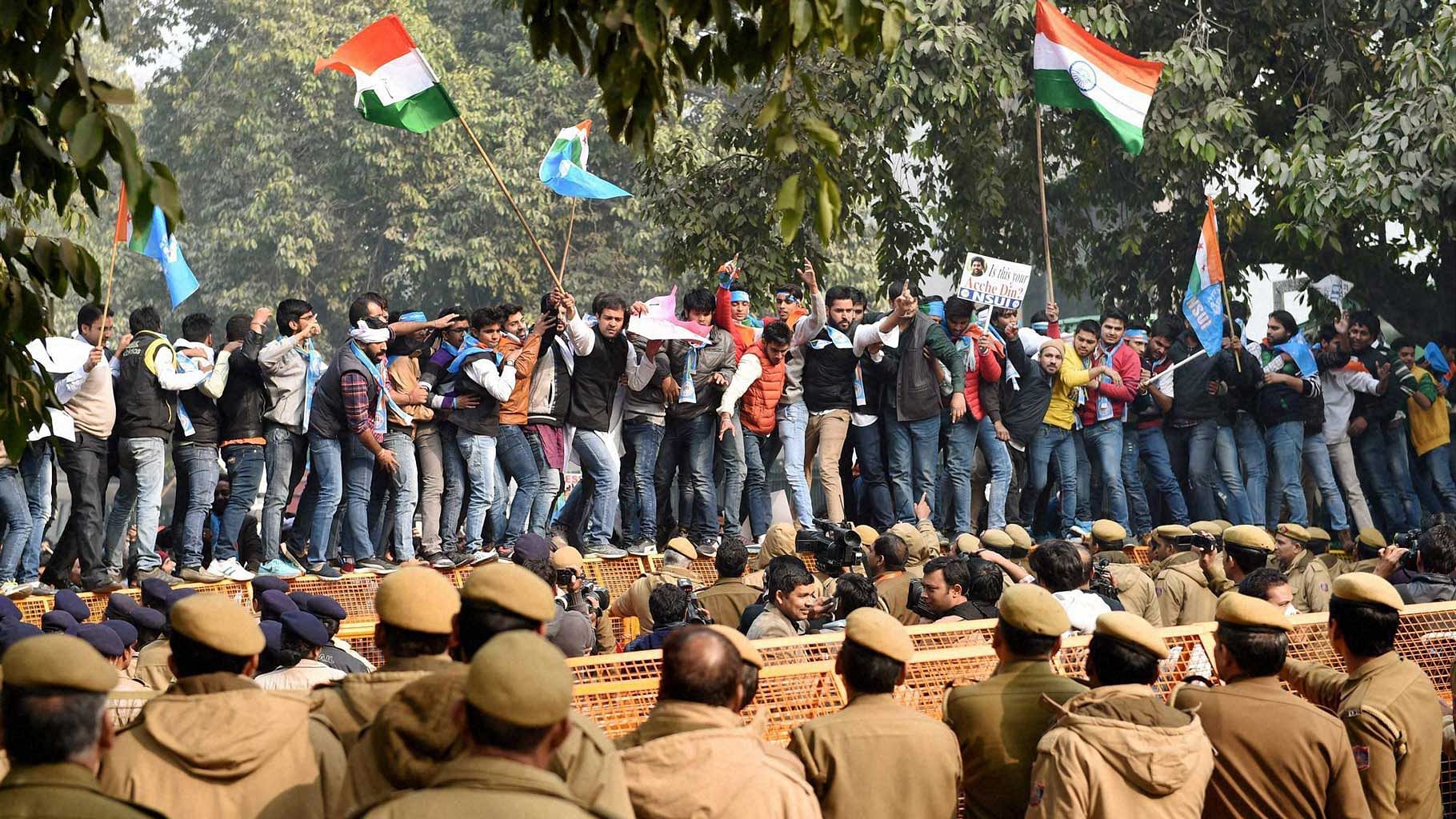 NSUI students protest against HRD Minister Smriti Irani and demanding her resignation. (Photo: PTI)