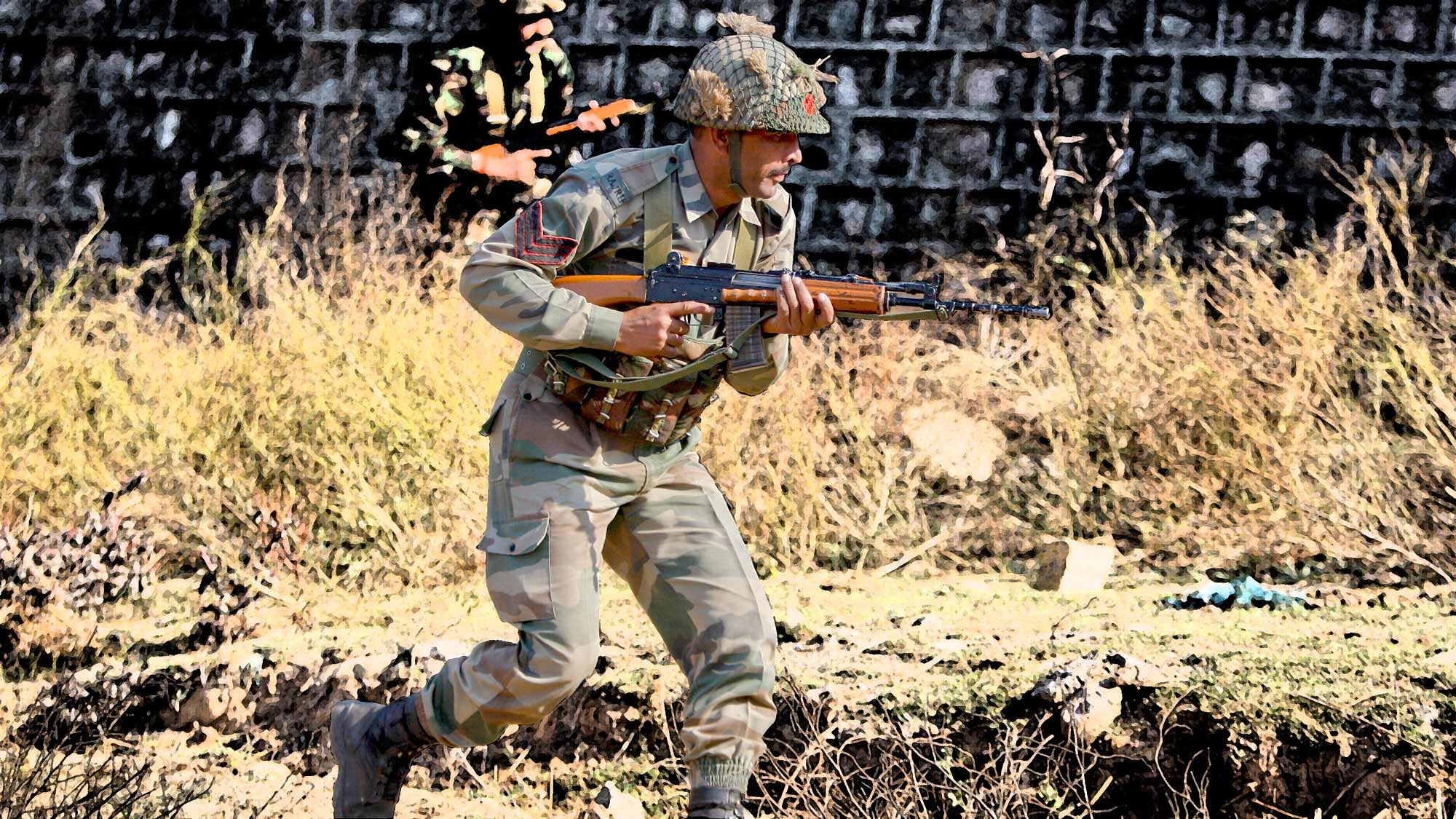 Soldiers conduct a search operation in a forest area outside the Pathankot air force base. (Photo: AP)