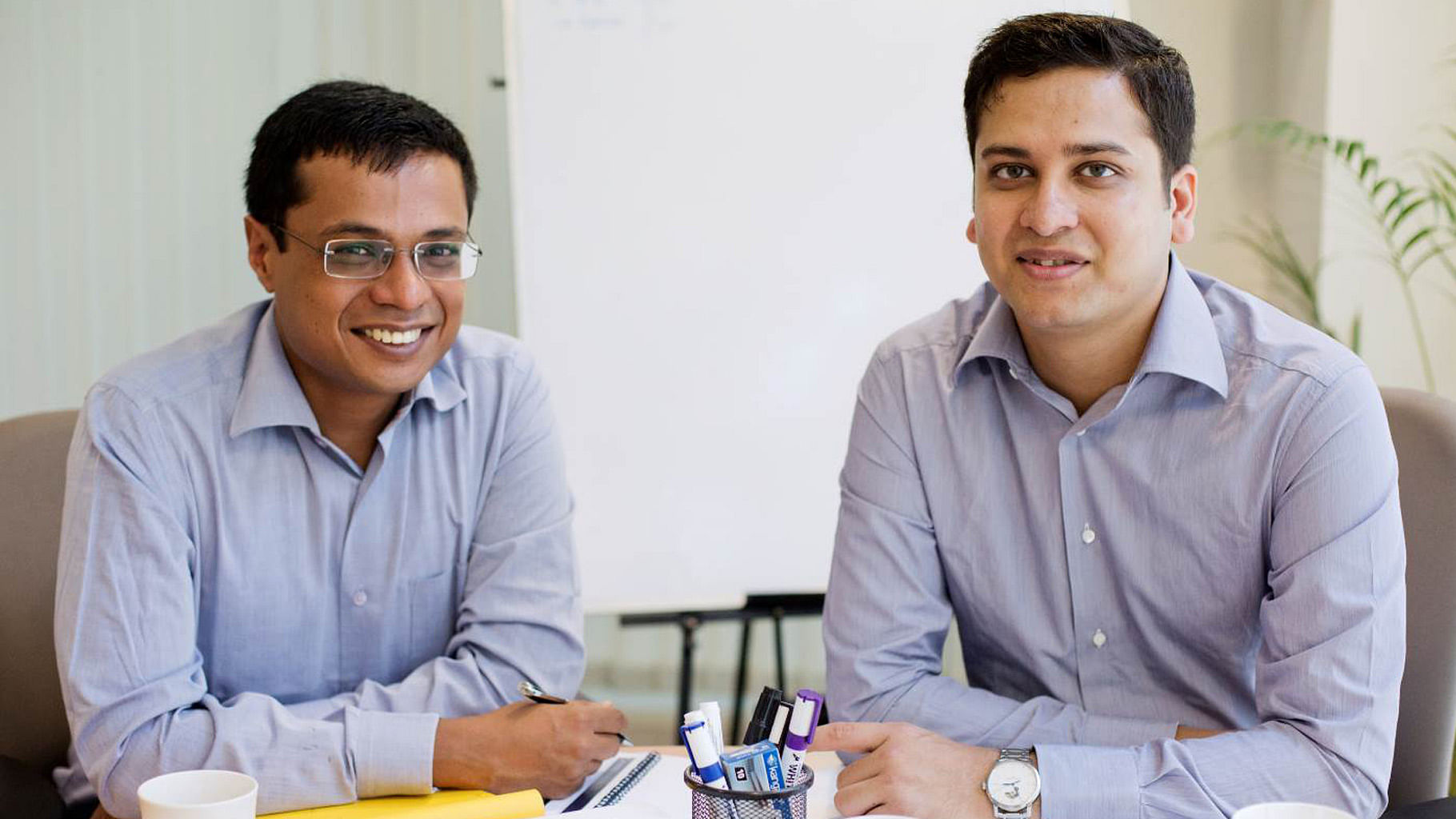 Flipkart co-founders Sachin Bansal (left) and Binny Bansal (right). 