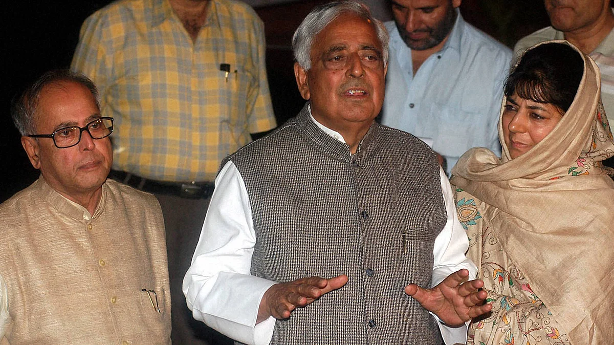 File photo of Mufti Mohammad Sayeed with his daughter Mehbooba Mufti and then Defence Minister Pranab Mukharjee after a meeting with UPA Chairperson Sonia Gandhi in New Delhi in October 2005. (Photo: PTI)
