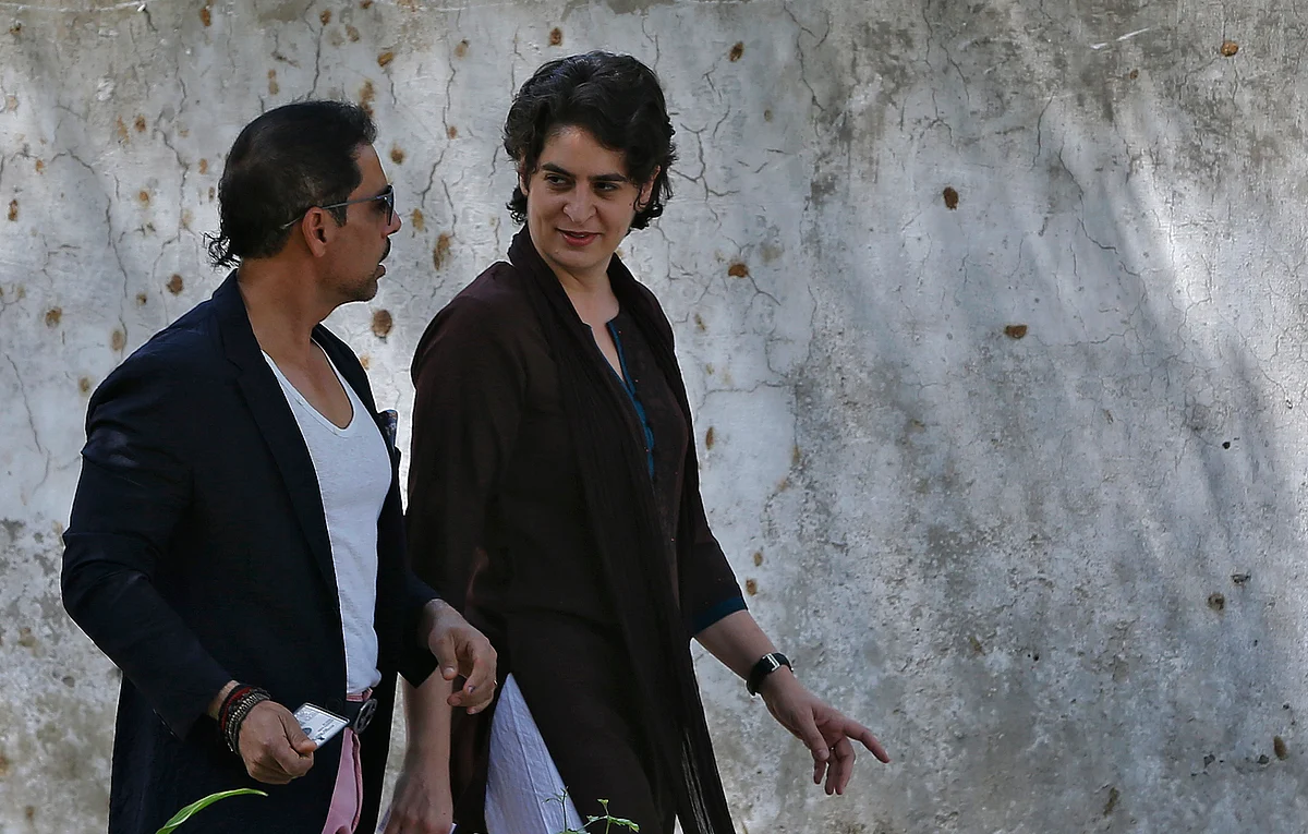 Priyanka Gandhi and husband Robert Vadra leave after casting their vote at a polling station in Delhi, 2014. (Photo: Reuters)