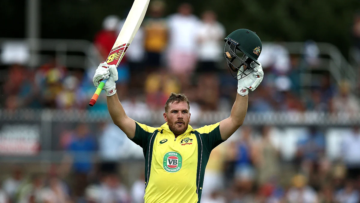 Aaron Finch celebrates his century in Canberra vs India. (Photo: AP)