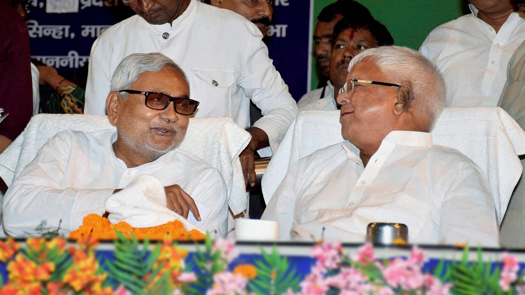 Bihar CM Nitish Kumar and RJD Chief Lalu Prasad Yadav. (Photo: PTI)