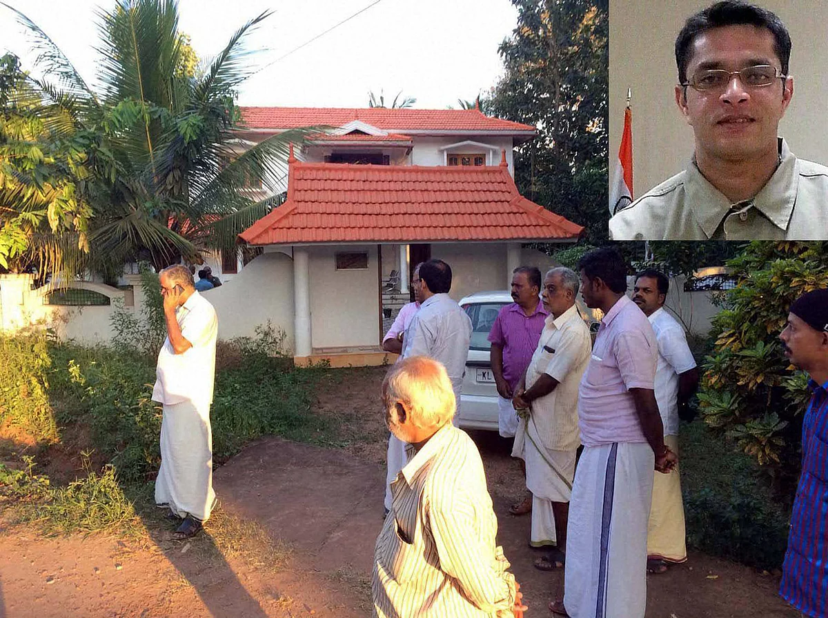 Friends and relatives arrive to pay tributes to Lt Col Niranjan Kumar (inset), the National Security Guards (NSG) commando who was killed in a grenade blast at the air base at Pathankot, at his home in Kerala. (Photo: PTI) 