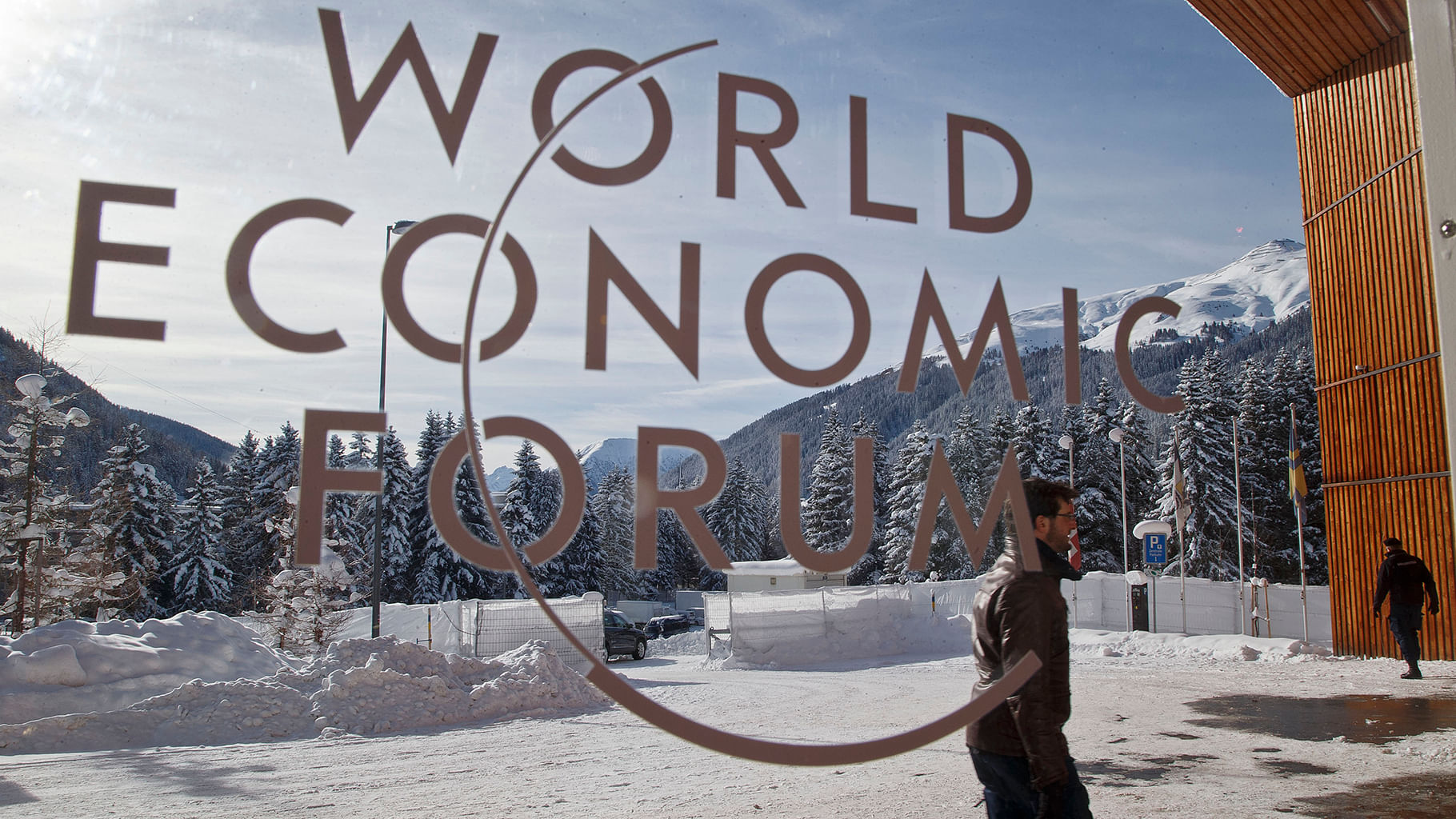 A man walks at the main entrance of the congress center
where the World Economic Forum will take place in Davos. 





(Photo: AP)