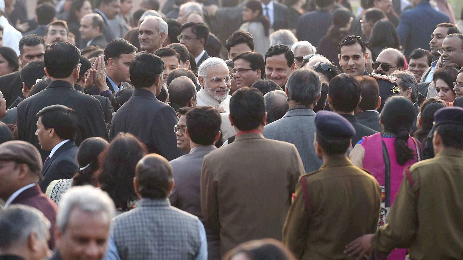 PM Modi meeting invitees during an At-Home reception hosted by President Pranab Mukherjee on the occasion of 67th Republic Day at Rashtrapati Bhavan, New Delhi on Tuesday. (Photo: PTI)