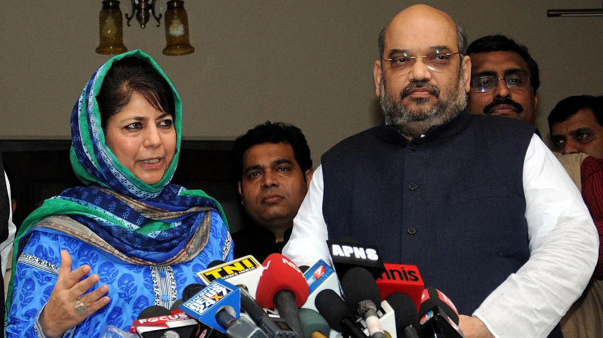 File photo of Mehbooba Mufti and BJP President Amit Shah. (Photo: PTI)
