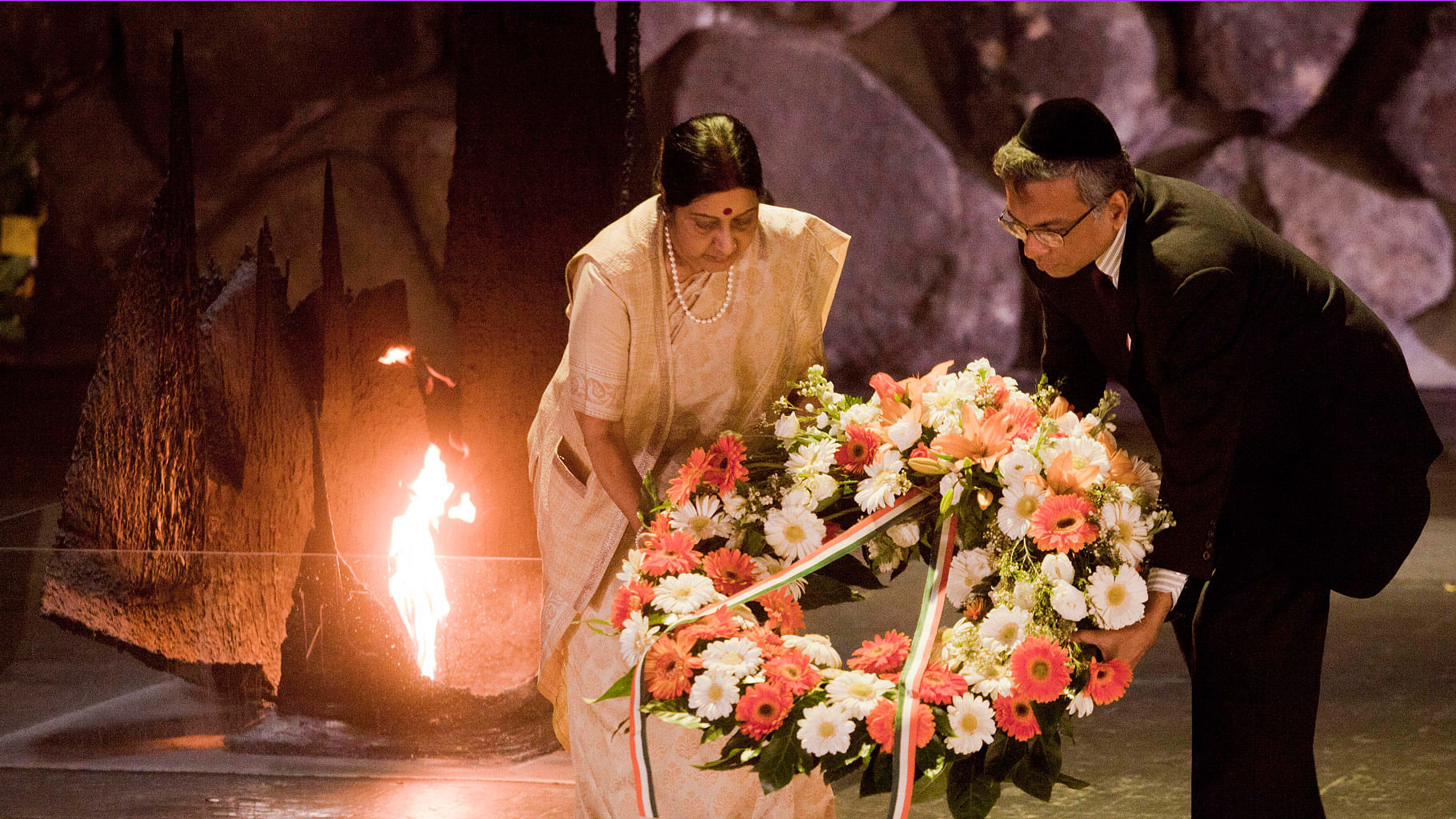 Minister of External Affairs, Sushma Swaraj, left, lay a wreath at the Hall of Remembrance at the Yad Vashem Holocaust memorial, in Jerusalem, Monday, January 18, 2016. (Photo: AP)
