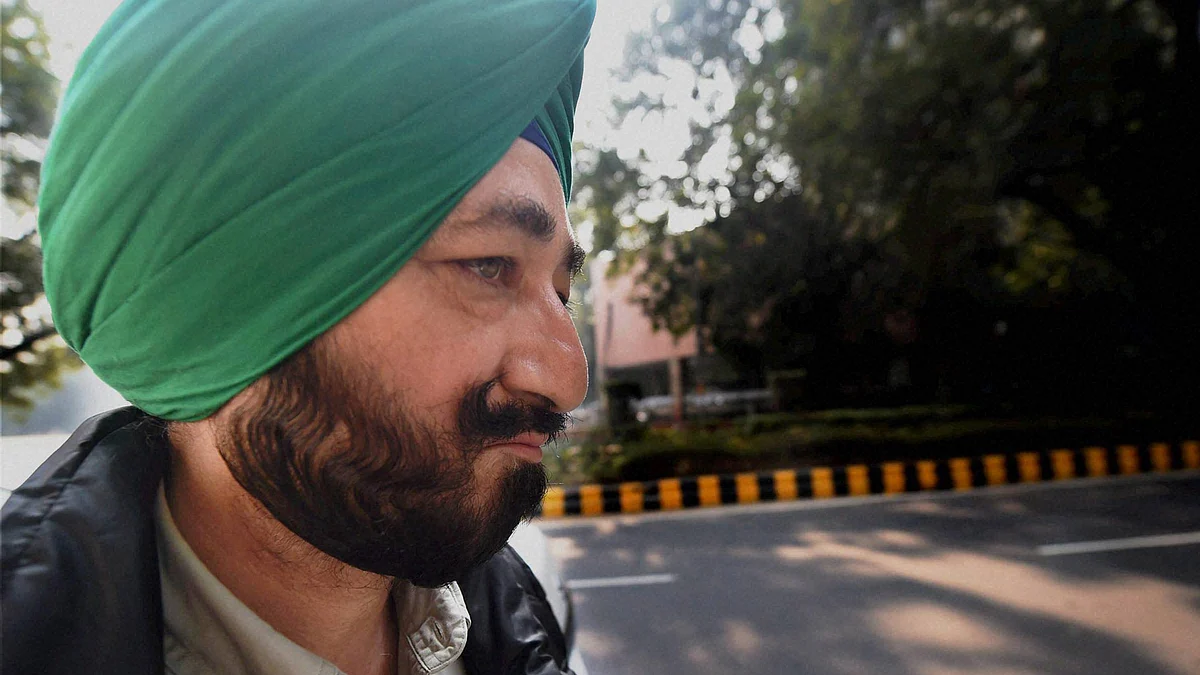 Gurdaspur SP Salwinder Singh, who was allegedly abducted by terrorists involved in the Pathankot attack, arrives to appear before NIA in New Delhi on Tuesday for a questioning in connection with the terror strike. (Photo: PTI)