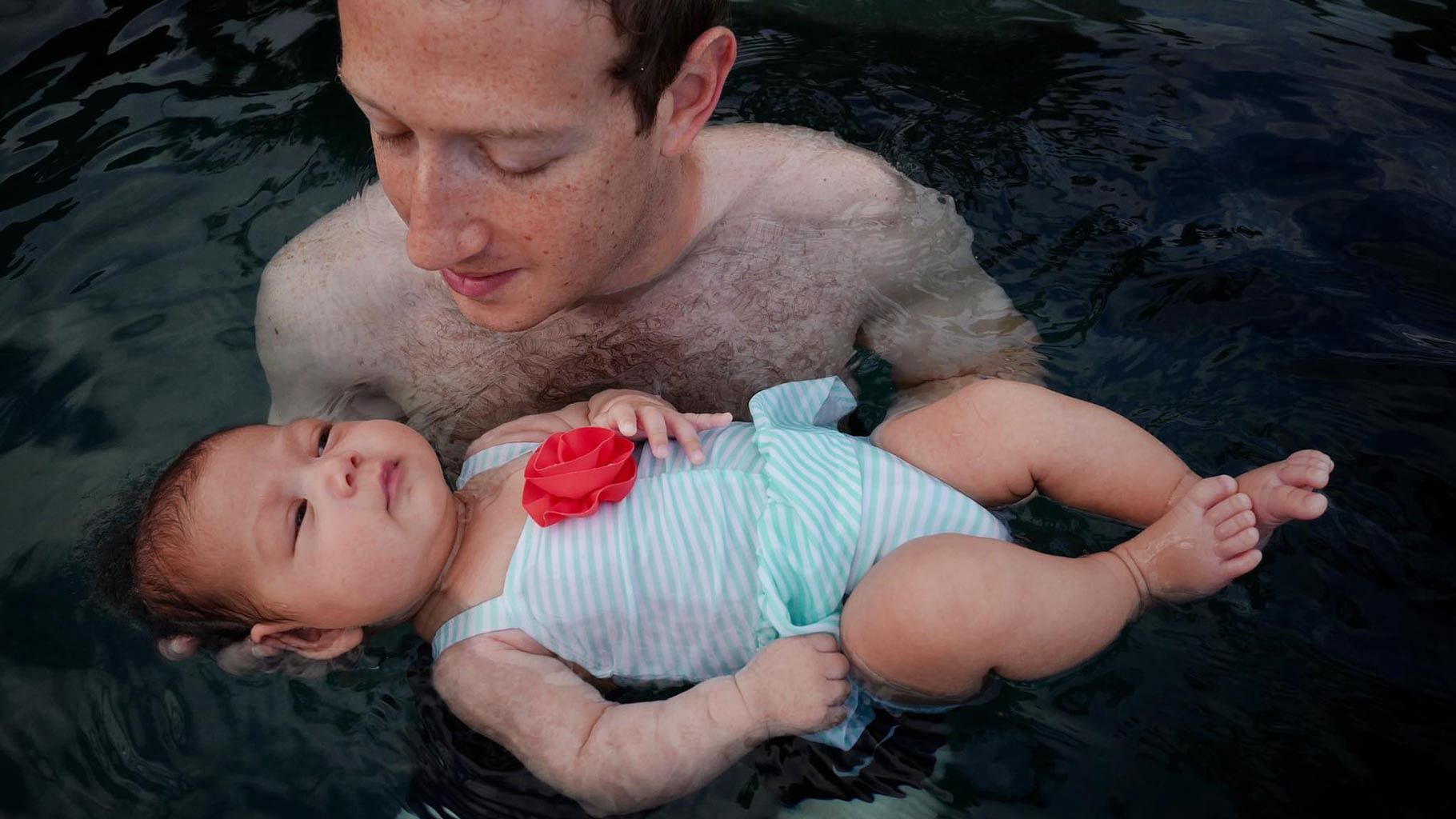 Facebook founder Mark Zuckerberg with two-month-old Max. (Photo Courtesy: <a href="https://www.facebook.com/photo.php?fbid=10102614874143051&amp;set=a.529237706231.2034669.4&amp;type=3&amp;theater">Facebook Page of Mark Zuckerberg</a>)