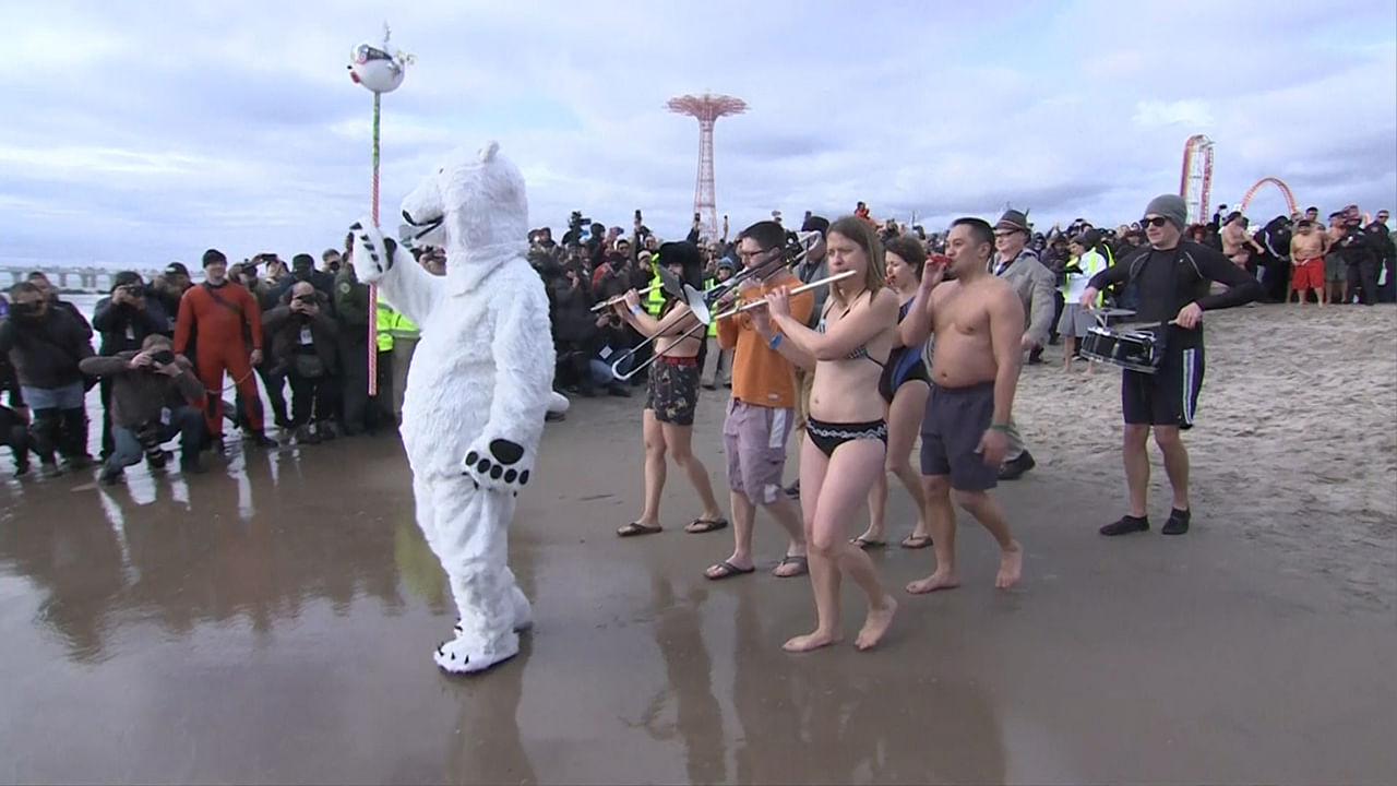 New Yorkers at the annual Polar Bear Plunge in Coney Island in Brooklyn, New York. (Photo: AP screengrab)