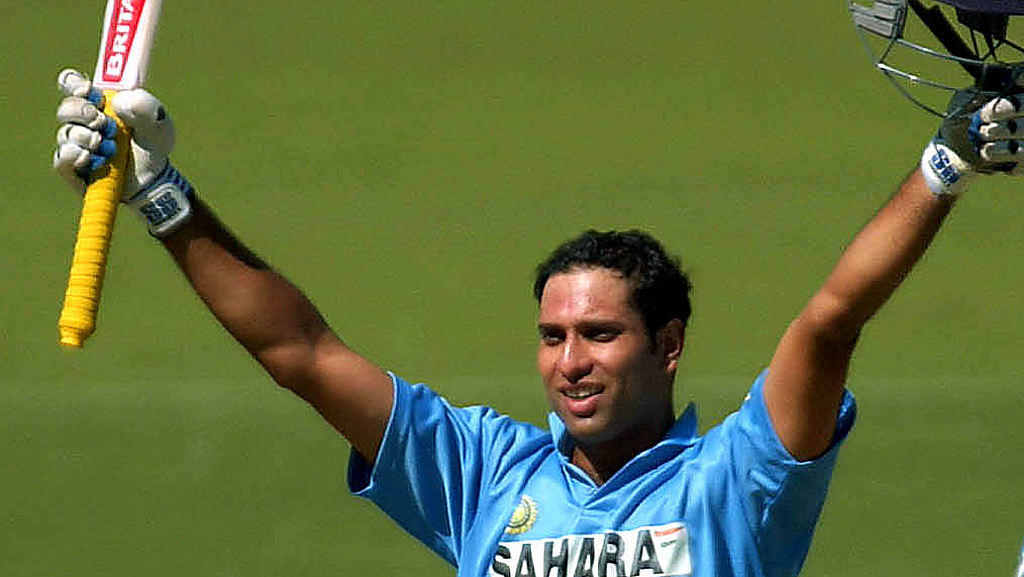 VVS Laxman raises his bat after scoring a century. (Photo: Reuters)