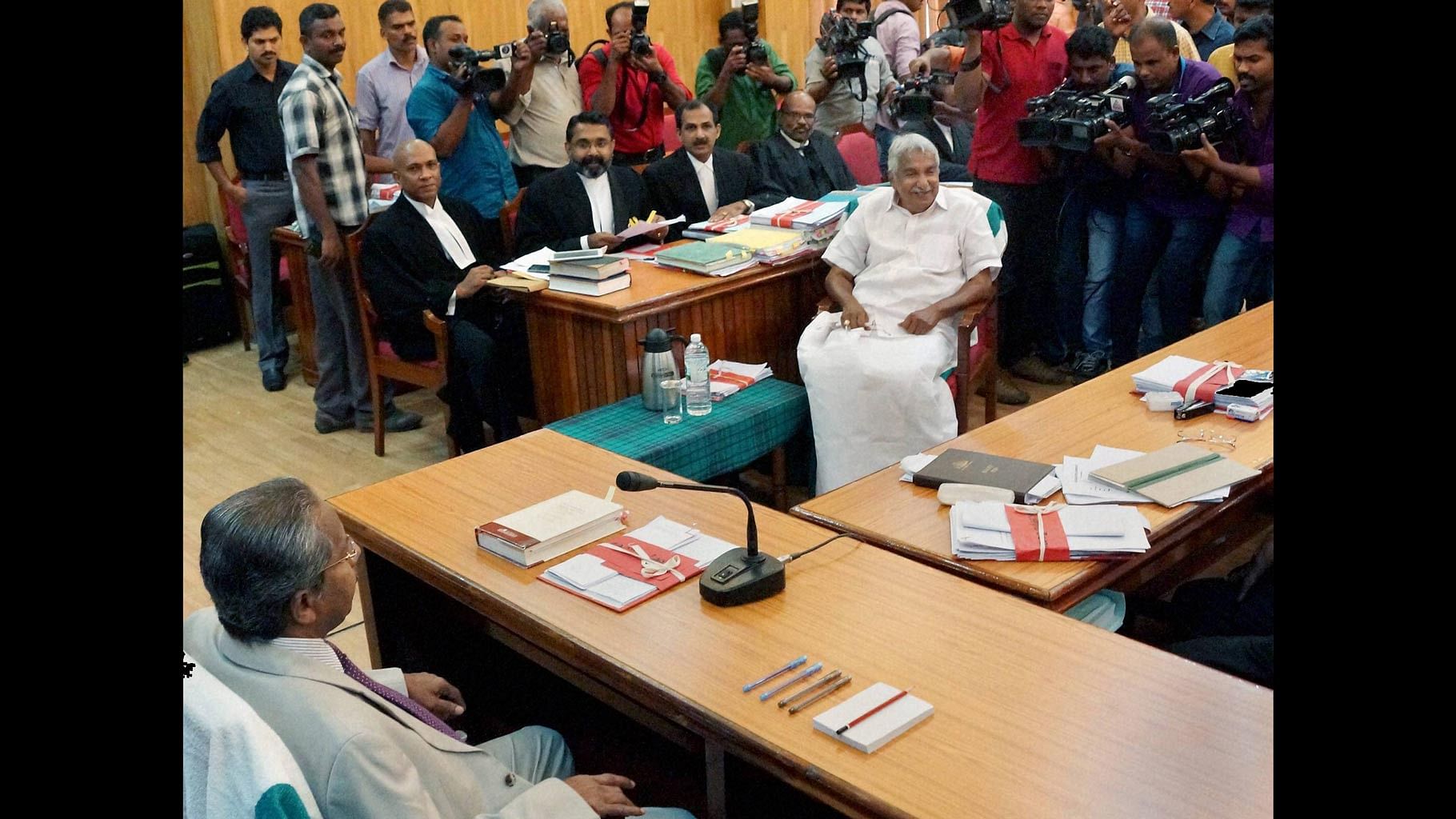 Kerala Chief Minister Oommen Chandy smiling in court. (Photo: PTI)