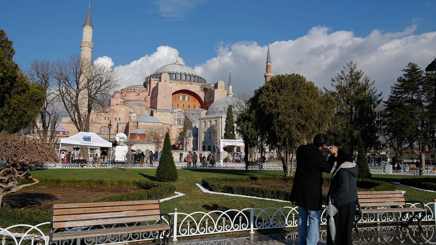 Tourists take pictures of the  Byzantine-era Hagia Sophia, in the historic Sultanahmet district in Istanbul. 