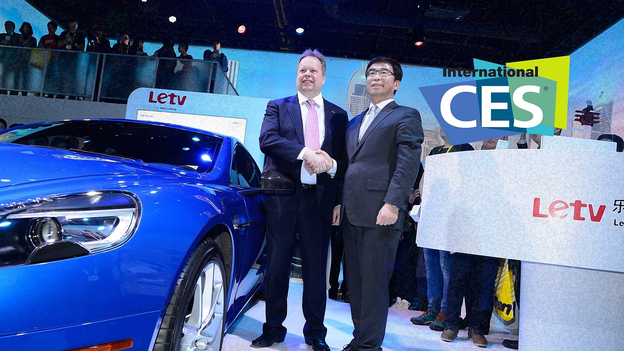 Global Vice Chairman of Letv’s SEE Plan Lei Ding (R) and Aston Martin CEO Dr Andy Palmer unveil a first look at the in-car entertainment and connected car technologies in an Aston Martin Rapide S at CES on Jan 6, 2016, in Las Vegas. (Photo: AP) 