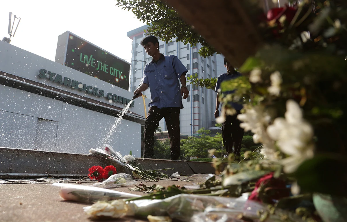 One bomb went off at a Starbucks cafe, while another went off at a police post outside the mall. (Photo: AP)
