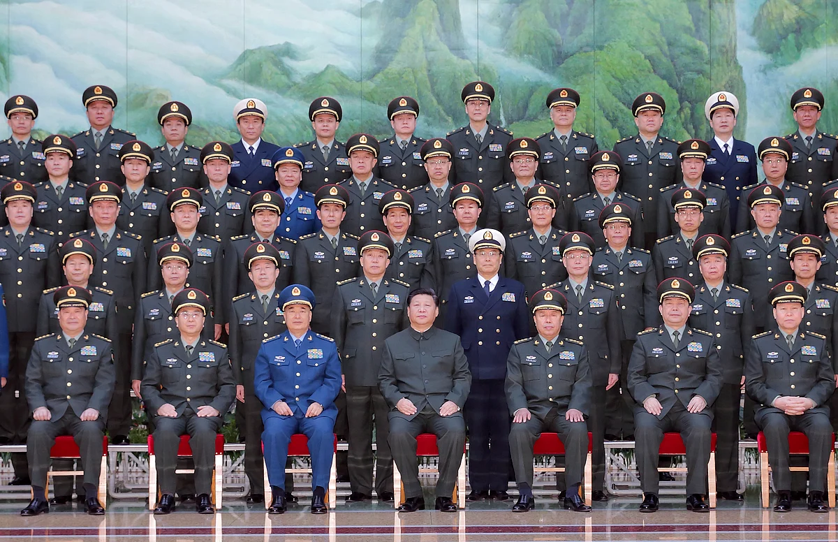 In this photo provided by China’s <i>Xinhua</i>, Chinese President Xi Jinping, center front, poses for a group photo during a meeting with the new heads of the reorganised organs of the Communist Party’s Central Military Commission in Beijing, Monday, January 11, 2016. (Photo: AP)