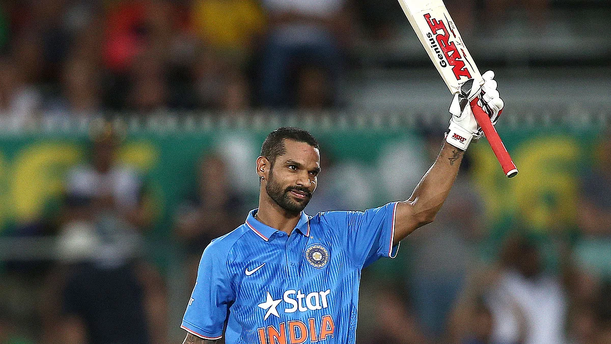 Shikhar Dhawan celebrates his century against Australia in Canberra. (Photo: AP)