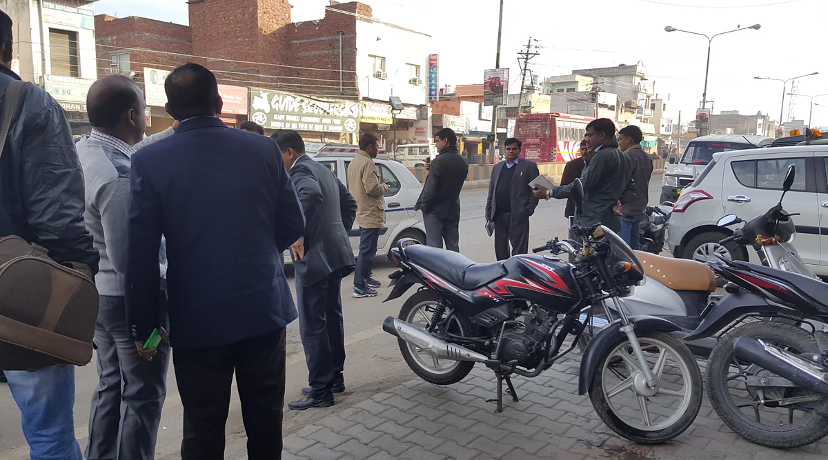 Some members of the National Investigation Agency in Pathankot town before leaving to continue with their probe. (Photo: Chandan Nandy)