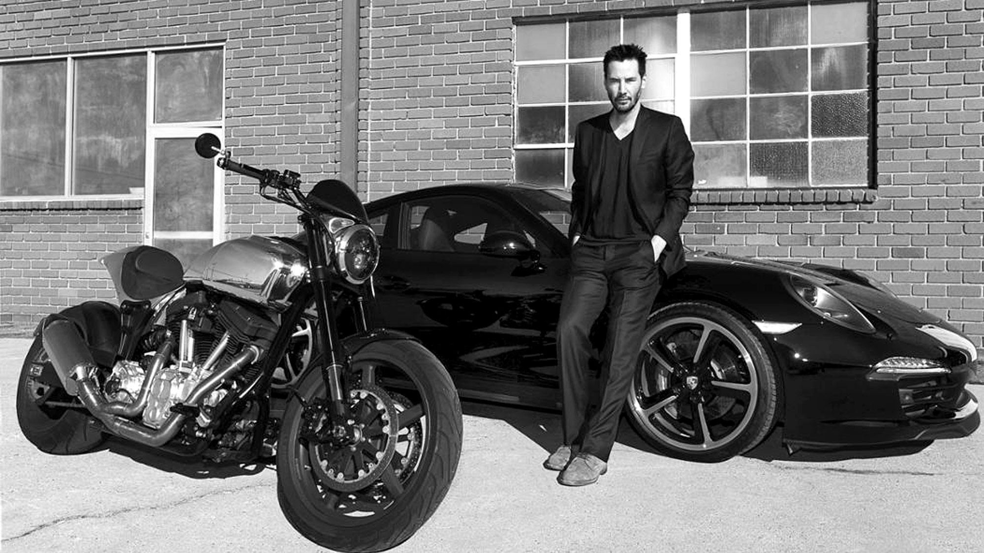Keanu Reaves with his custom Porsche 911 and KRGT-1. (Photo: Porsche)