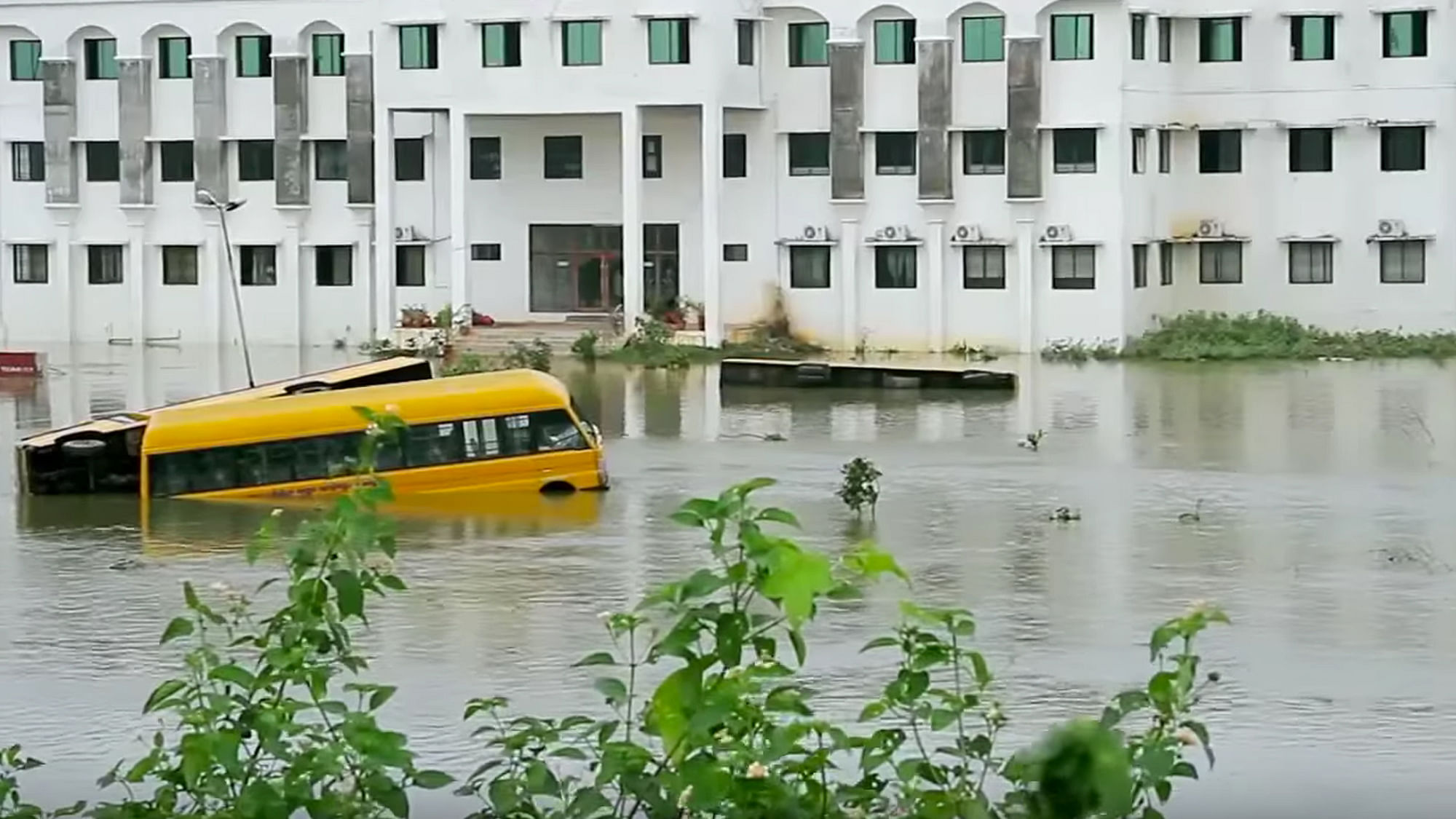 A bus almost submerged in water during the Chennai floods. (Photo Courtesy: Screengrab from the video)