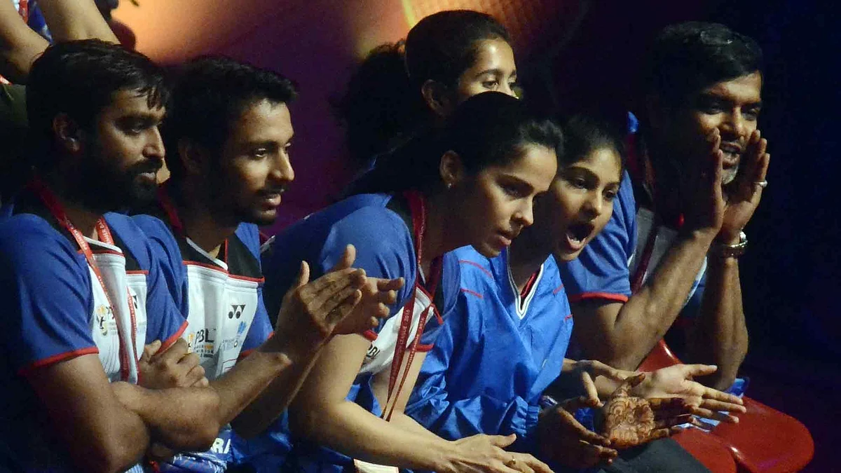 Awadhe Warriors cheer on their team-member during the Premier Badminton League. (Photo: IANS)