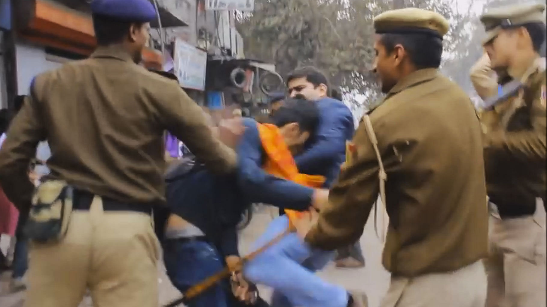 Screen grab from the video showing Delhi Police personal cracking down on protesters. (Photo Courtesy: Sanghapali Aruna Kornana’s Facebook)