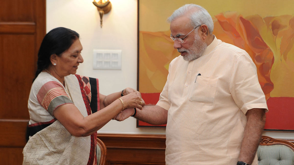 A controversy over a land deal by her daughter has landed the the Gujarat CM Anandiben Patel in a political storm. 