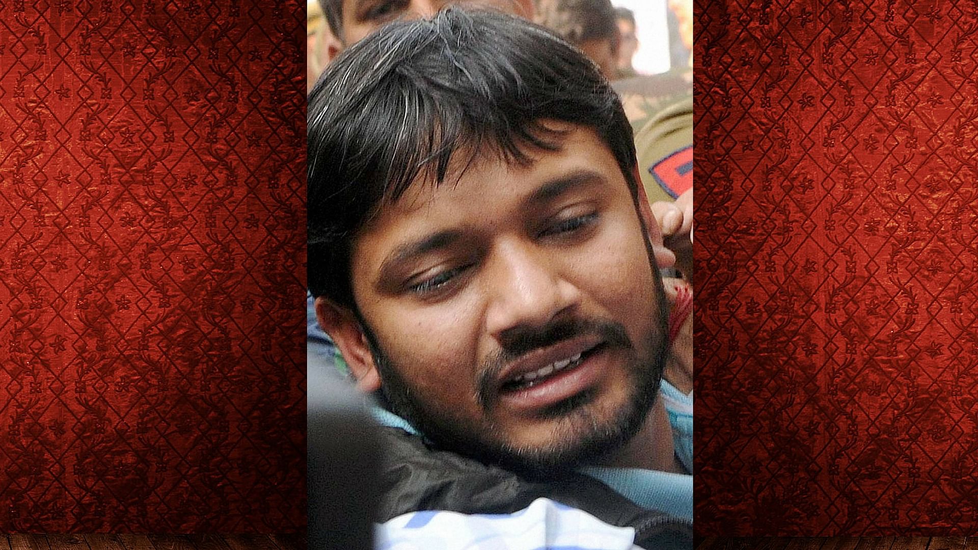  JNUSU President Kanhaiya Kumar, who had been arrested on charges of sedition, being produced at Patiala House Courts in New Delhi last week.. (Photo: PTI/Altered by The Quint)