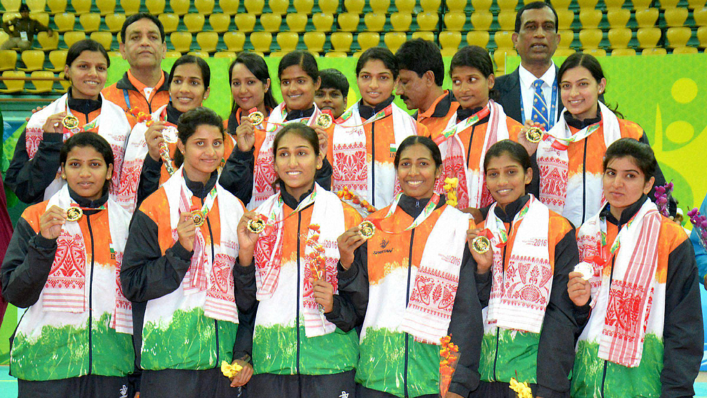 Indian team players pose for a group photograph after their win against Sri Lanka in the women’s volleyball event at 12th South Asian Games 2016 in Guwahati on Tuesday. (Photo: PTI)