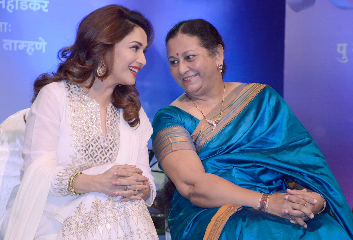 Madhuri Dixit launches Nutan’s biography penned by Lalita Tamhane