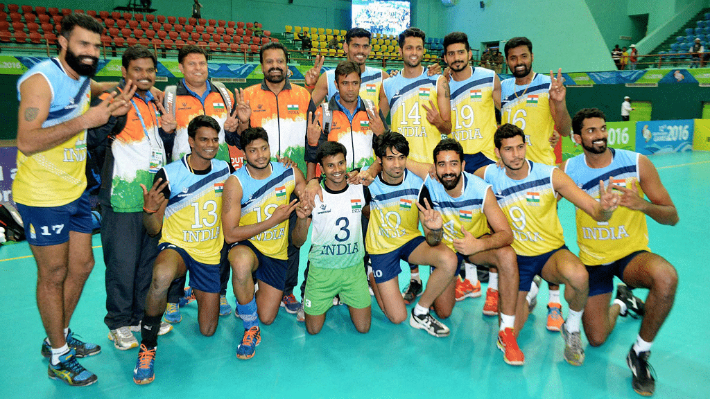 Players and officials of Indian Volley Ball team celebrate after defeating Sri Lanka in the final match at 12th South Asian Games 2016 in Guwahati on Tuesday. (Photo: PTI)
