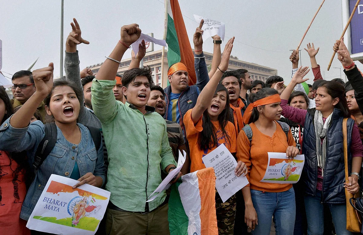 ABVP activists protest against an event at JNU supporting Parliament attack convict Afzal Guru in New Delhi. (Photo: PTI)