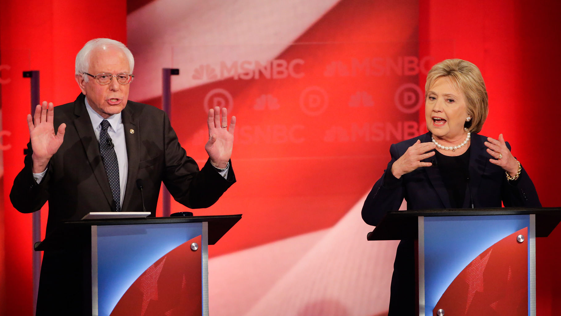 Democratic presidential candidate, Sen Bernie Sanders (L)  and Democratic presidential candidate, Hillary Clinton (R) spar during a Democratic presidential primary debate  at the University of New Hampshire on Thursday, 4 Feb 2016. (Photo: AP)   