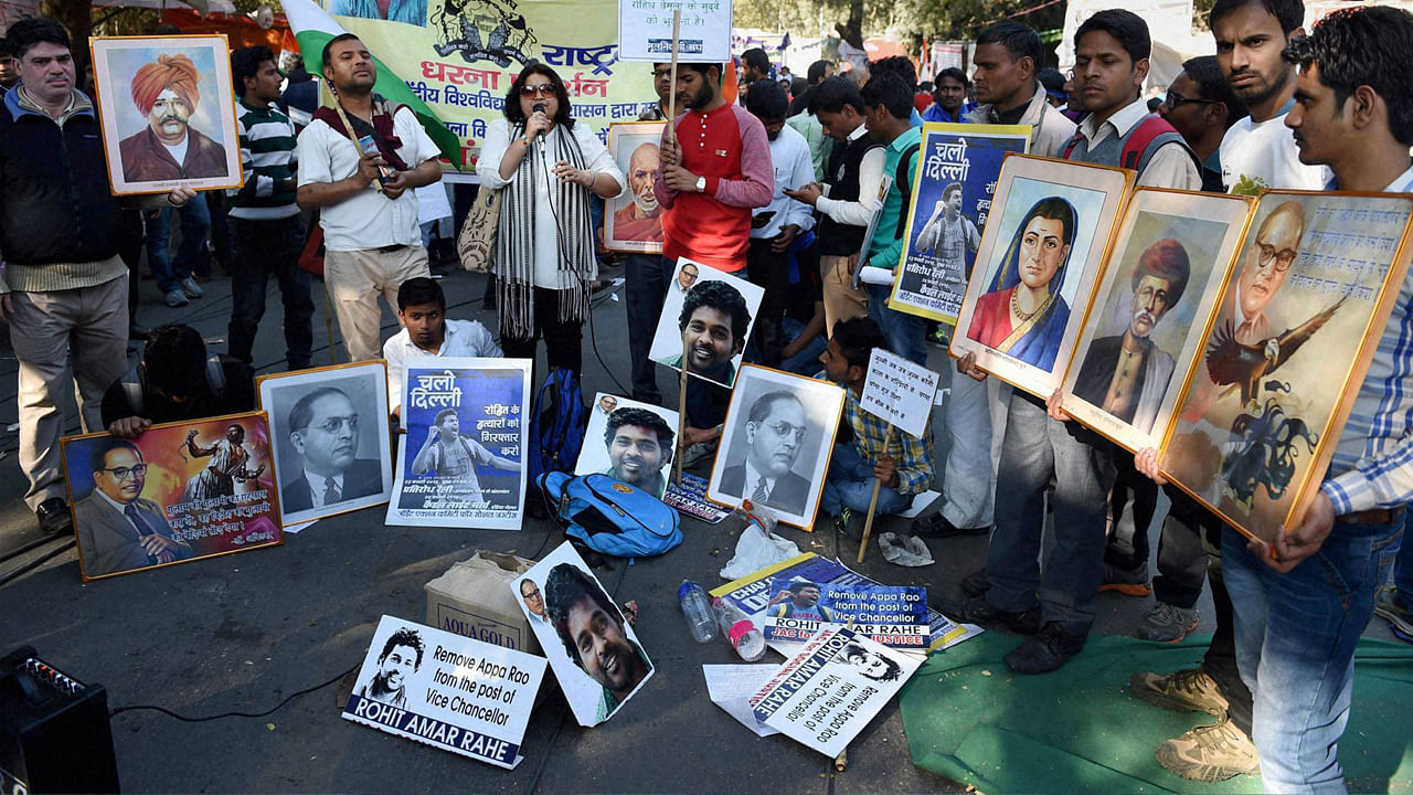 Students raise slogans during a  rally demanding justice for Dalit scholar Rohith Vemula‘s at Jantar Mantar in New Delhi on Tuesday. (Photo: PTI)   