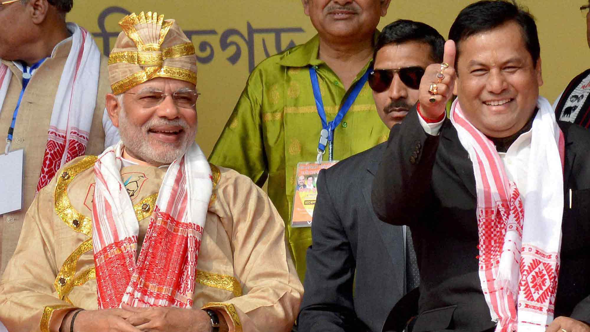Prime Minister Narendra Modi along with Assam Chief Minister  Sarbananda Sonowal. (Photo: PTI)