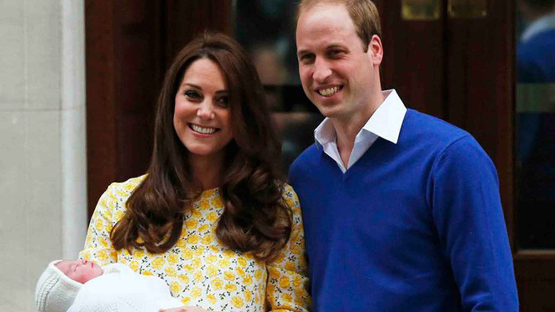Britain’s Prince William and Kate, Duchess of Cambridge and their newborn baby girl pose for cameras as they leave St Mary’s Hospital’s exclusive Lindo Wing in London on Saturday, 2 May 2015. (Photo: Reuters)
