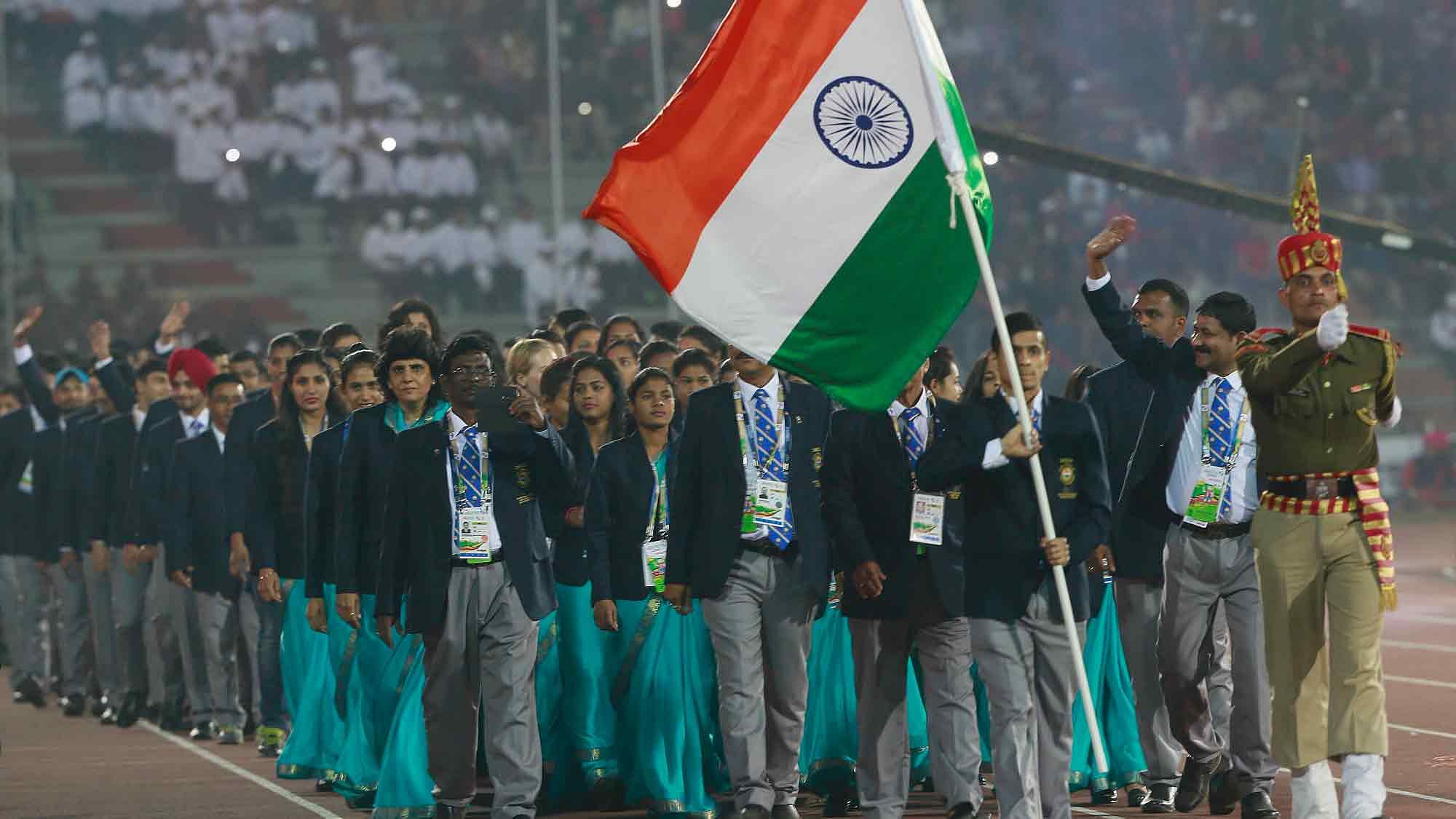The author, Saurav Ghosal, was the flagbearer for India at the opening ceremony of the South Asian Games. (Photo: AP)