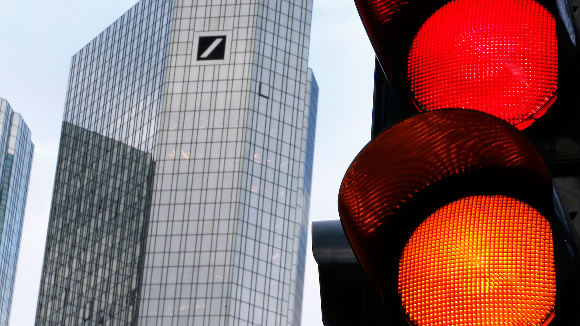 Traffic lights stand near the headquarters of Deutsche Bank in Frankfurt, Germany. (Photo: AP)
