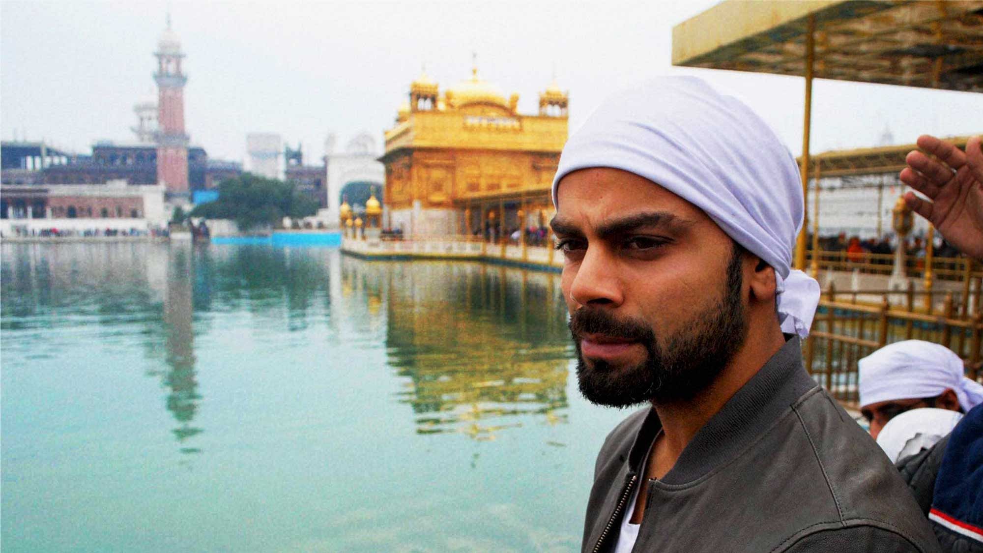Indian vice-captain Virat Kohli visited the Golden Temple with his family. (Photo: PTI)