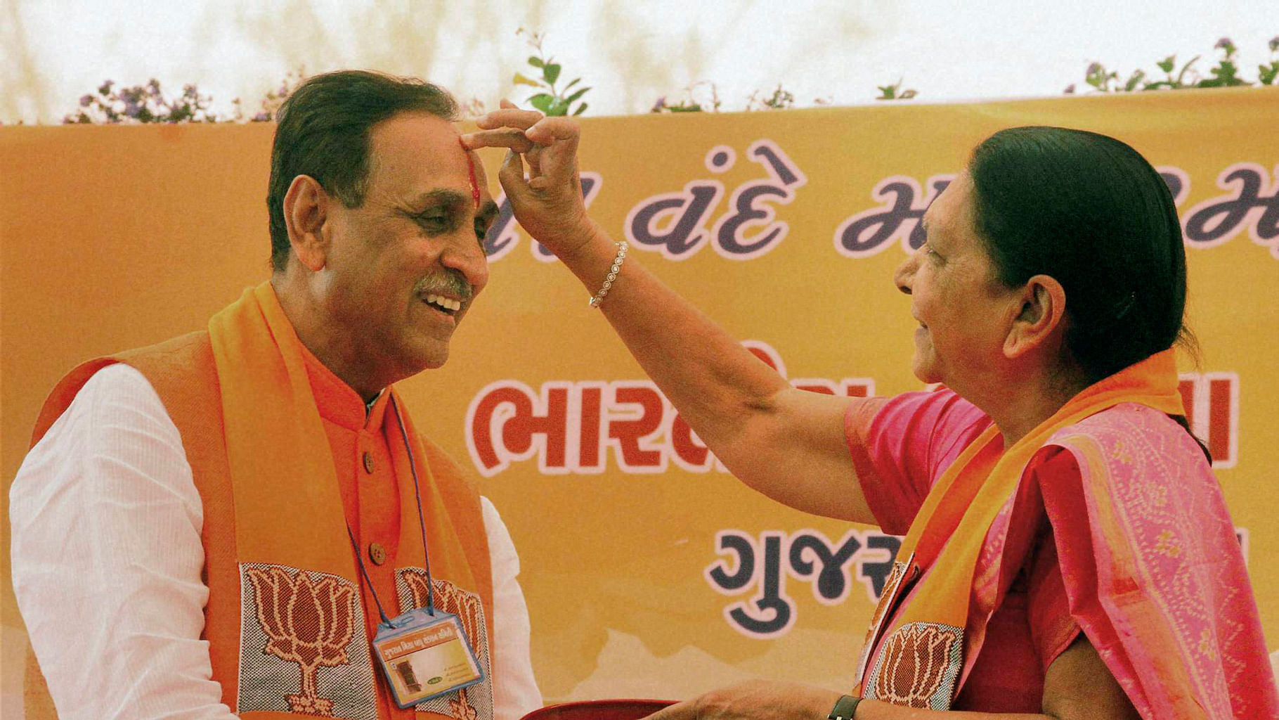 File photo of Gujarat CM Vijay Rupani and former CM Anandiben Patel.