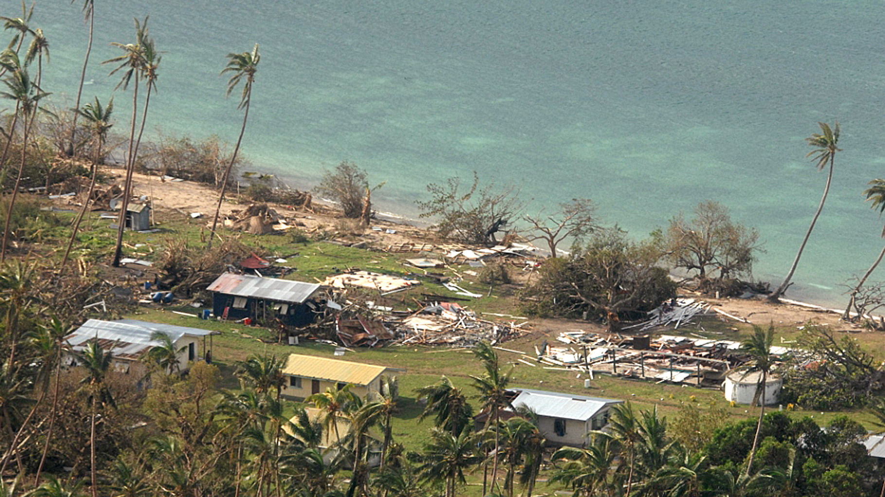 Aerial photo of debris  scattered around damaged buildings at Susui village in Fiji, after Cyclone Winston tore through the island (Photo: AP)